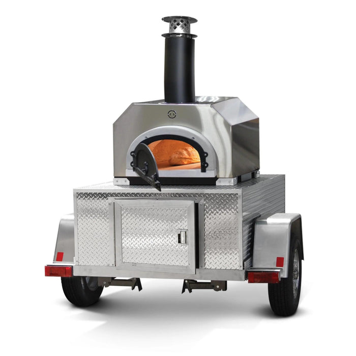 A portable outdoor pizza oven with a stainless steel finish, on wheels for easy transport, labeled as the Chicago Brick Oven CBO-750 Tailgater.